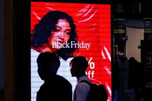 US Black Friday spending at stores inches ahead as Americans spend more online