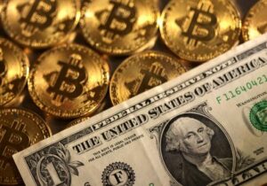 Dollar rises as US business activity ticks up in October